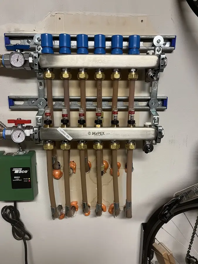 Plumber performing Gas Leak Detection at a residential property in Manalapan